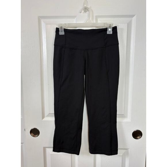 Lululemon Black Capri Leggings Size 6 Ruched and Slit Back Hem - Picture 1 of 8